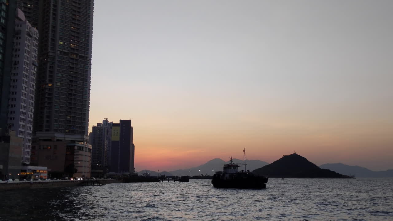 Scenic Sea View At Dusk From Kennedy Town On Hong Kong Island In Hong Kong. wide