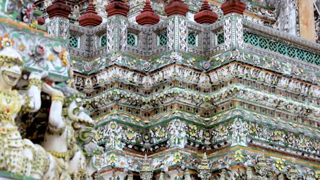 close-up views of wat arun's ornate architecture