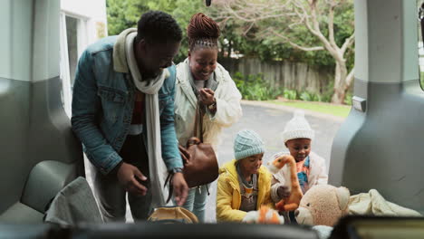 car, black family and packing for road trip