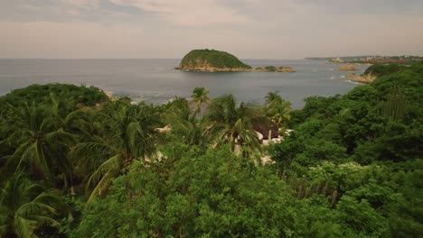 Aerial-capturing-landscape-along-the-mesmerizing-coastline-in-Huatulco,-Mexico