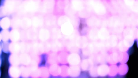 fondo de bokeh abstracto púrpura de la luz de la linterna thai lanna por la noche. conceptos de celebración en el festival yi peng.