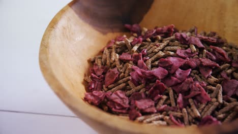 Cereal-bran-stick-and-dried-fruits-in-a-bowl-4k