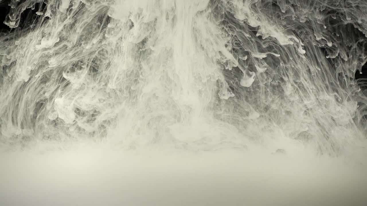 Paints. Abstract forms. Shooting on a black background
