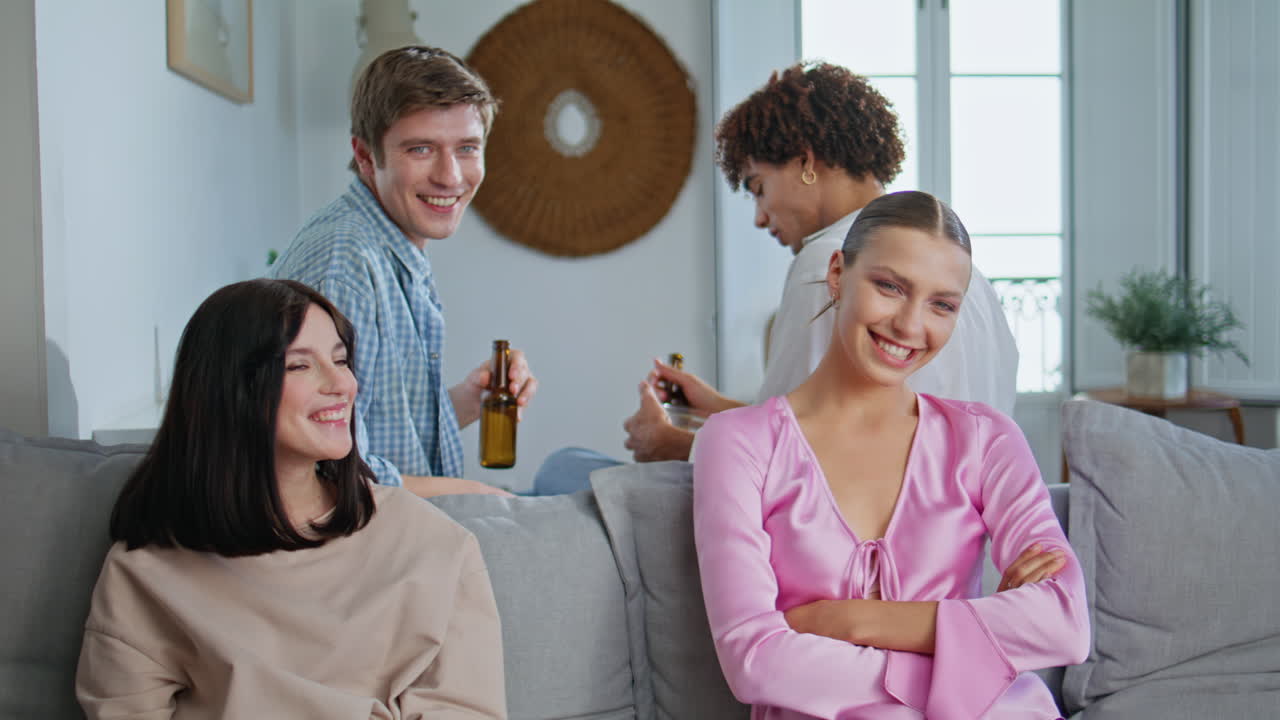 Girl winner rejoicing success playing video game at light home gathering closeup