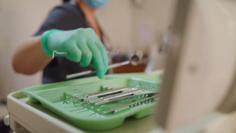 closeup of dentist using excavator