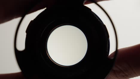 Adjusting-Manually-Lens-Aperture-Mechanism-Of-Photography-Optical-Device,-Close-Up