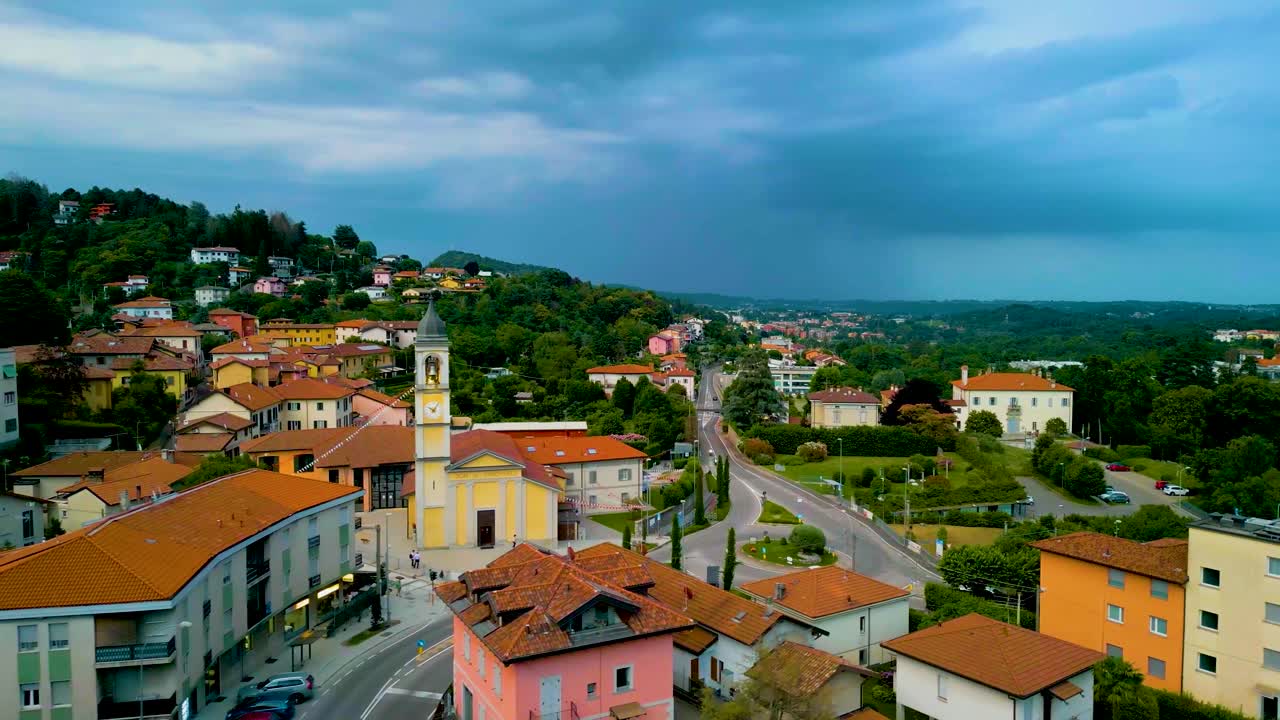 4K Aerial Drone Video of Church Belltower and Roundabout in Cavallasca, Italy on a Summer Evening