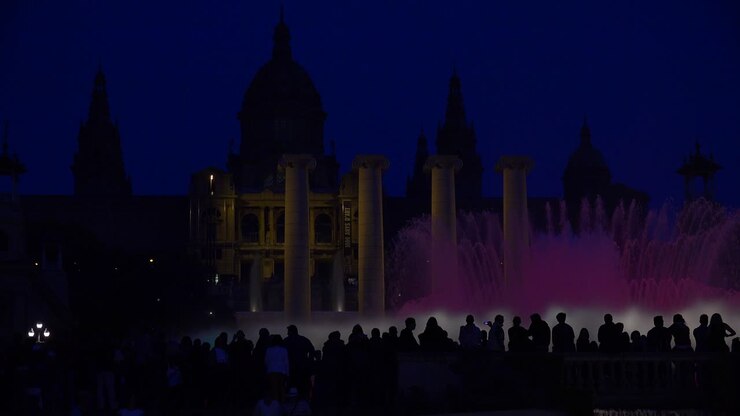A beautiful light show and dancing fountains in front of the National palace i Barcelona Spain