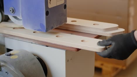 woodworking process with machine and human