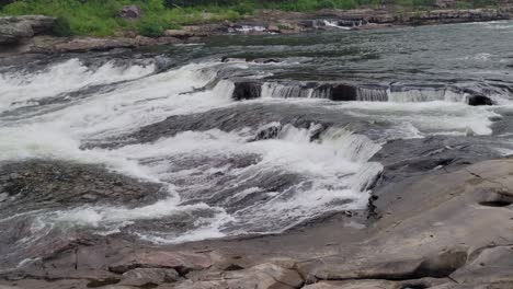 river shallow waterfall cascading over rocks