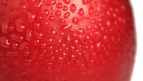 Wet-red-apple-rotating-