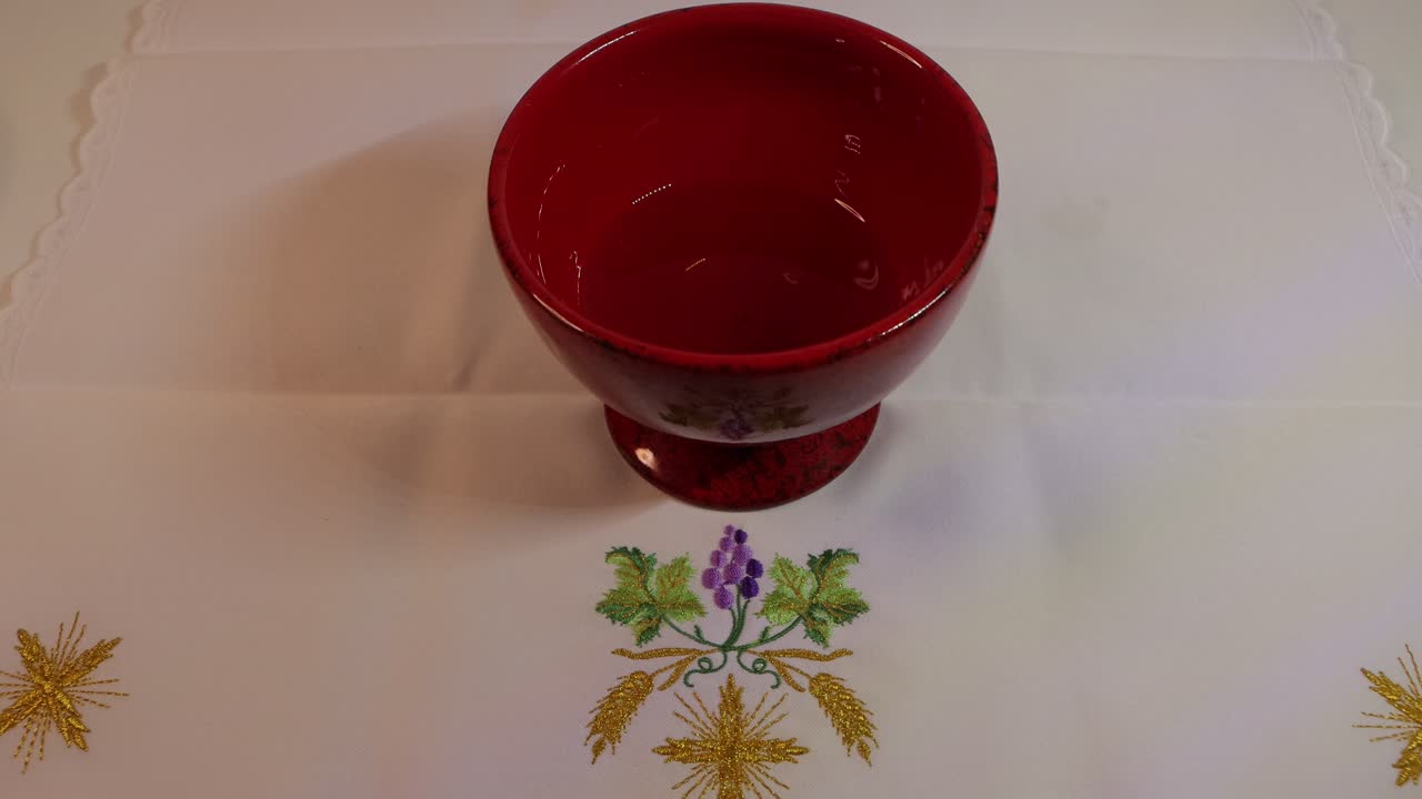 in the eucharist the love of jesus christ incarnate and transformed into bread and wine is presented from slowly life