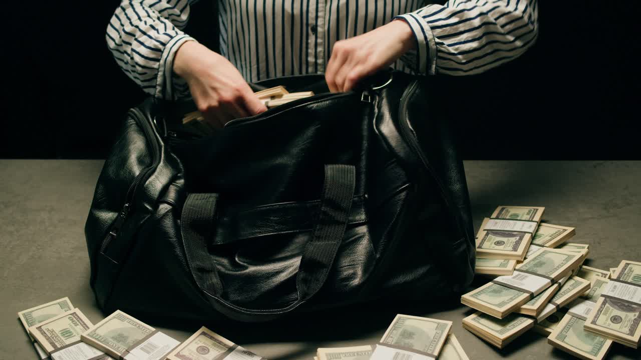 Specialised police officer Counting dollar banknotes in crime lab, conceptual image. High quality 4k footage