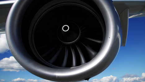 close-up of airplane engine and wing