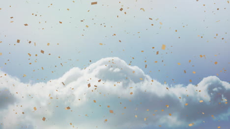 gold confetti falling over clouds in blue sky, creating festive atmosphere