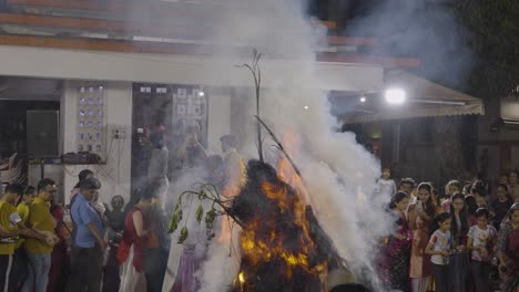 People-Celebrating-Hindu-Festival-Of-Holi-With-Bonfire-In-Mumbai-India-2