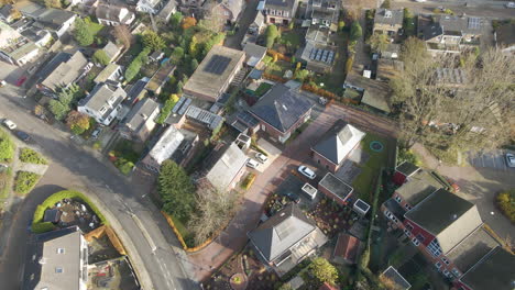 Jib-up-of-new-houses-with-solar-panels-on-rooftop-in-an-older-suburban-neighborhood