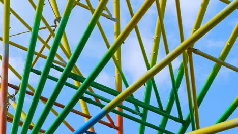 metallic multi-colored construction of a ferris wheel.