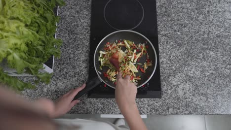 preparing a stir-fry dish