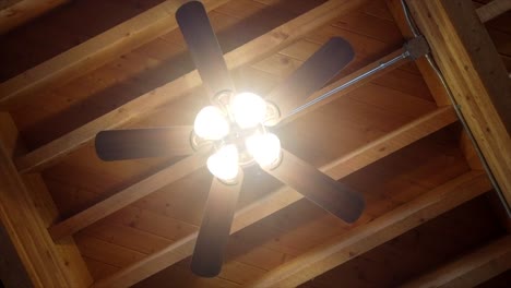 a static spinning camera view of a ceiling fan