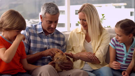happy family with pet cat