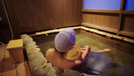 Japanese Girl In Hot Spring Bath, Relaxing in Onsen Town