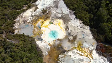 Colorful-Silica-Terraces-At-Orakei-Korako-Thermal-Park,-The-Hidden-Valley,-North-Island,-New-Zealand---aerial-top-down