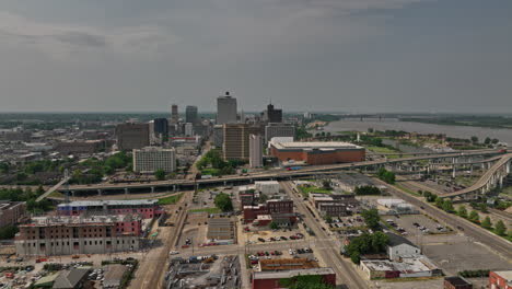 memphis tennessee aerial v42 reverse flyover uptown residential neighborhood, dramatic zoom into downtown capturing urban cityscape and interstate highway traffics - shot with mavic 3 cine - may 2022