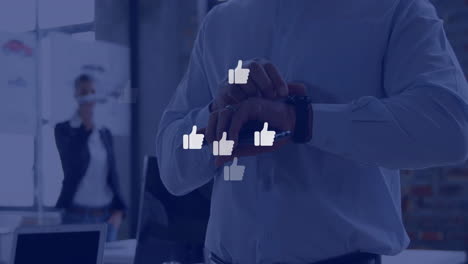 animation of media icons over caucasian businessman using smartphone