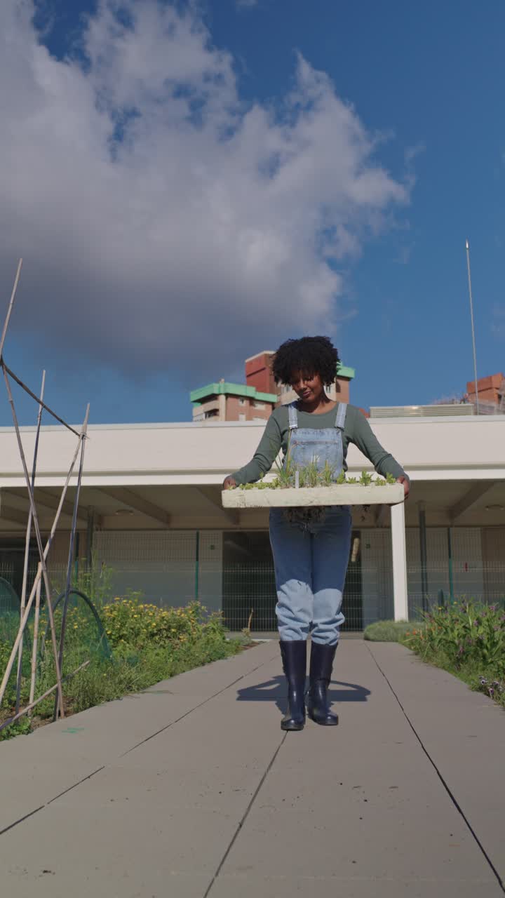 Woman Gardening in Community Garden