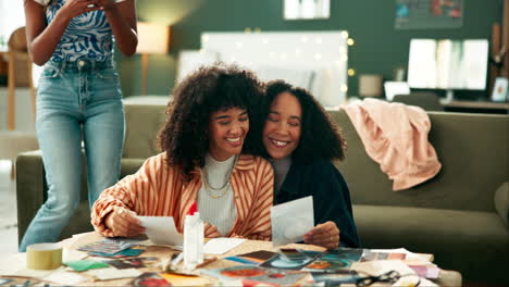 two women laughing over photographs