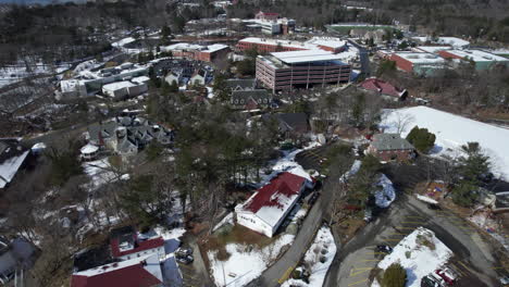 drone shot of residential in rural area in winter in beverly, massachusetts, usa