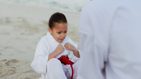 Beach,-teaching-karate-or-child-training