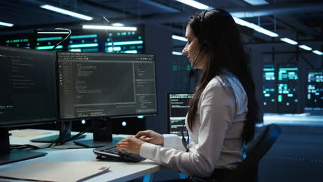 worker in server farm establishment oversees infrastructure systems