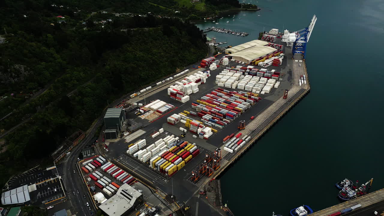 Aerial view of commercial logistic port chalmers in dunedin new Zealand import and export overseas of goods