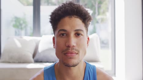 Portrait-of-happy-biracial-man-looking-at-camera