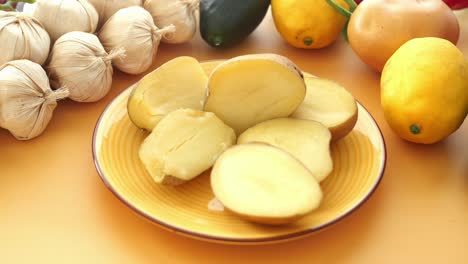 sliced boiled potatoes with vegetables