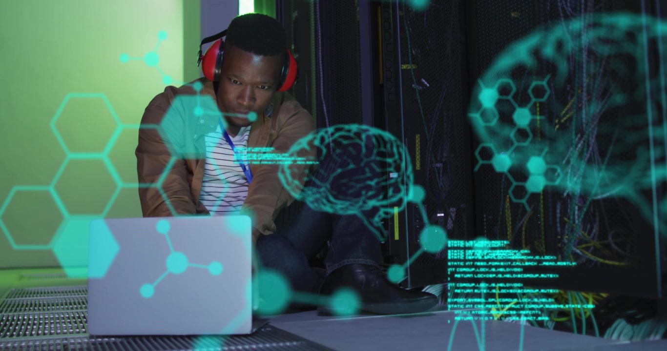Animation of brains, molecule structures, computer language, african american man using laptop