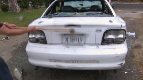 a man destroys his car with a sledgehammer 5