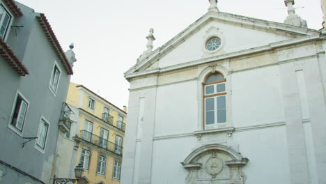 panoramic of the buildings around a street in lisbon