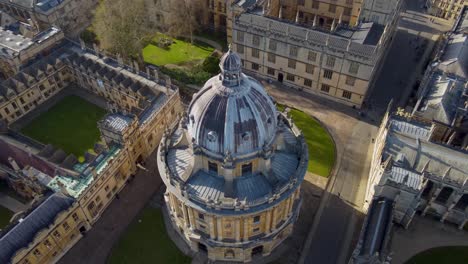 crane up aerial shot over the radcliffe camera library in oxford england