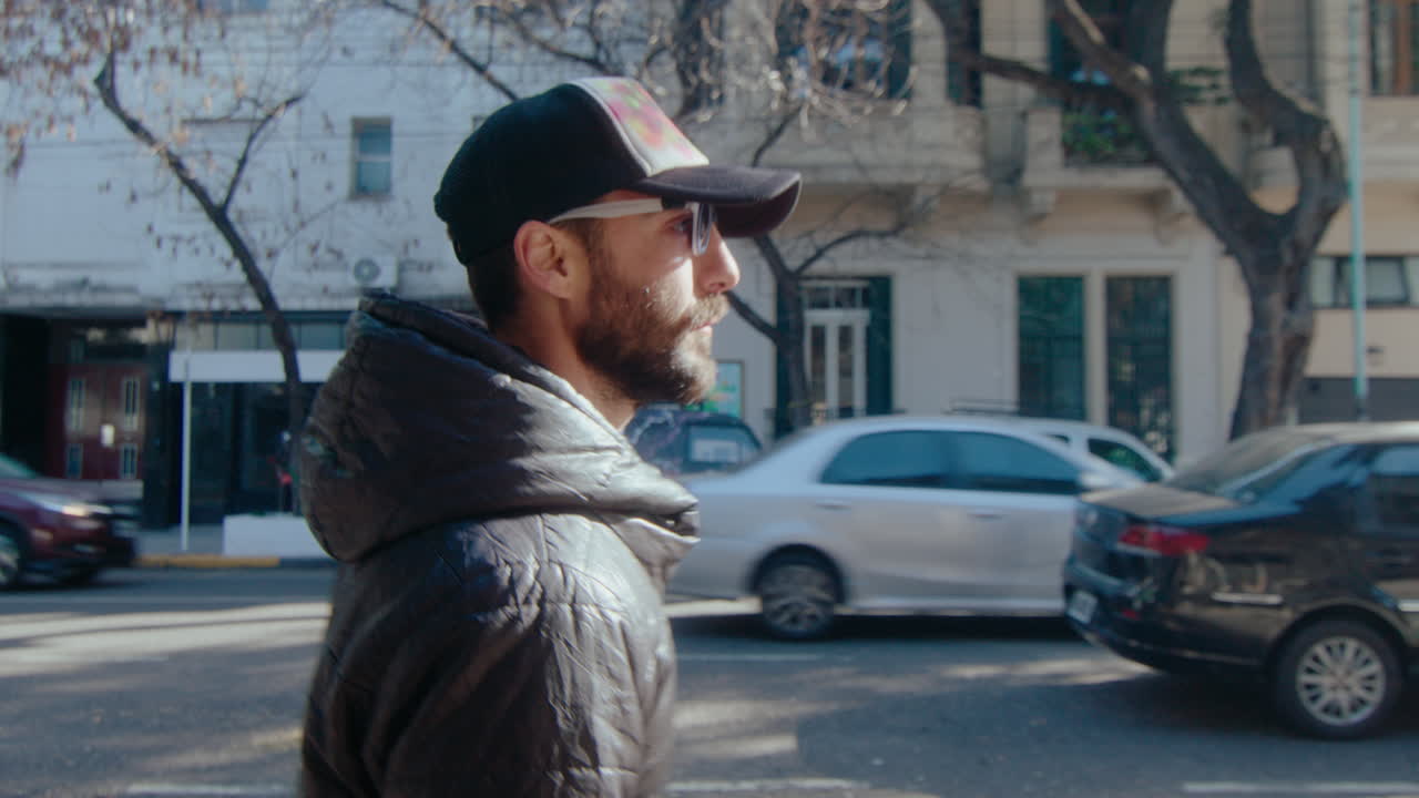 Graffiti Artist Walking along Street with Basket Full of Painting Supplies