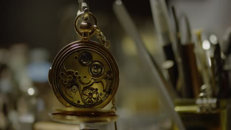 a pocket watch is spinning its gears