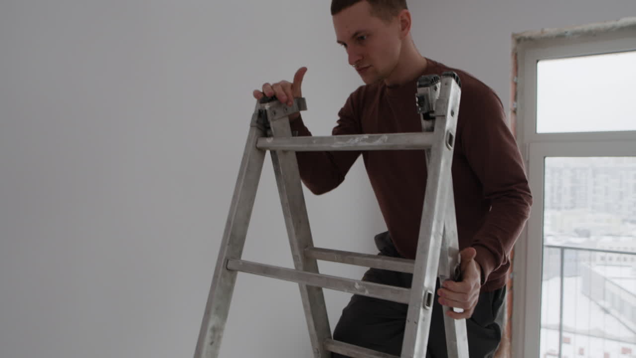Couple Doing Home Improvement: Painting a Room
