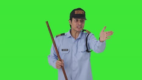 Angry-Indian-security-guard-yelling-someone-Green-screen