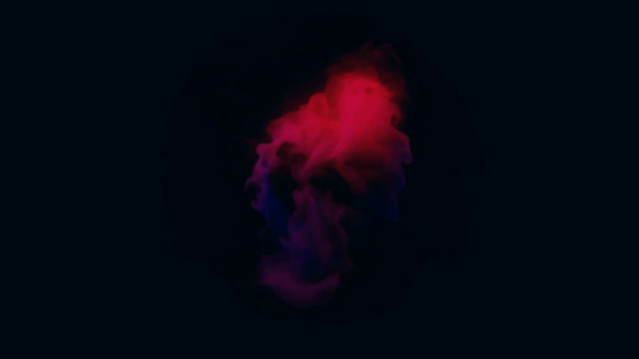 Colorful smoke envelops a sphere.