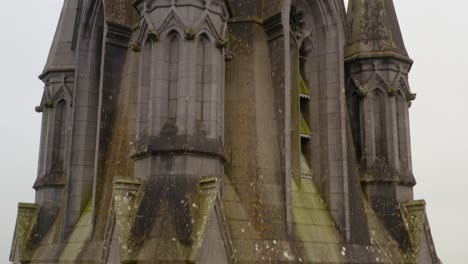 Saint-Michael's-Church-in-Ballinasloe-Galway-moss-covered-tower-and-window-spires