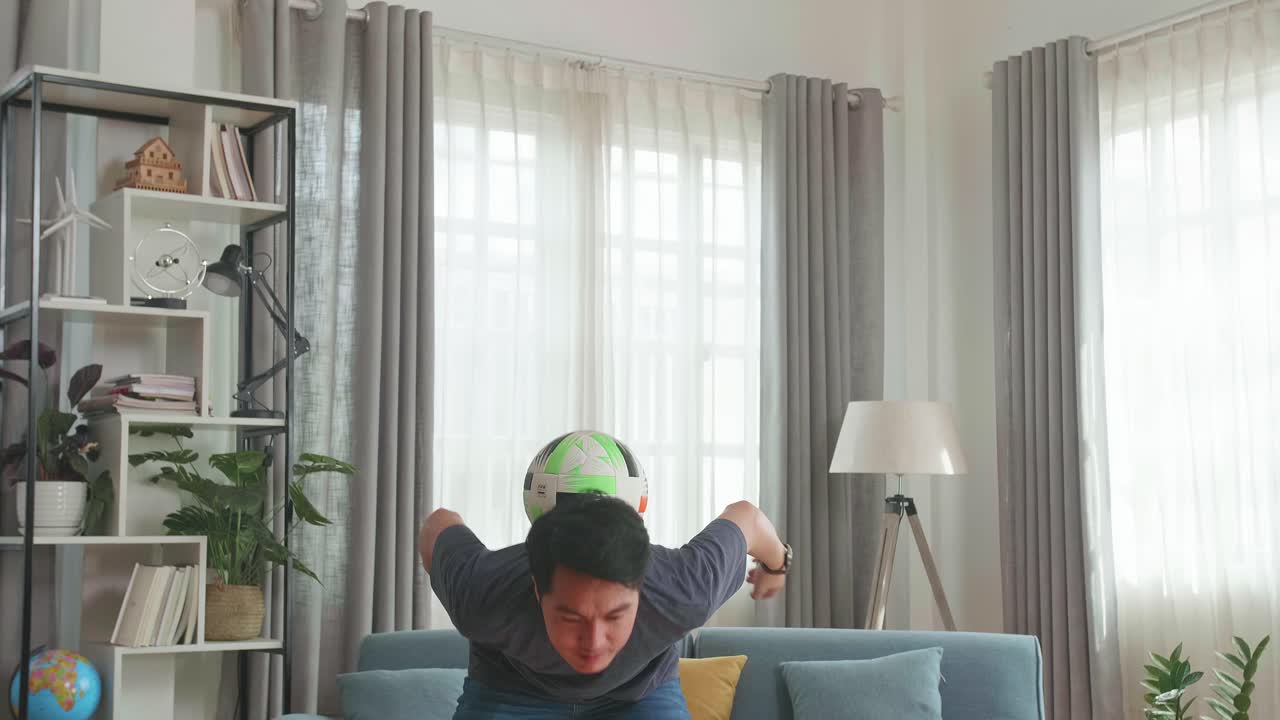 Asian Man Show Skill With Soccer Ball In Living Room, Soccer Freestyle