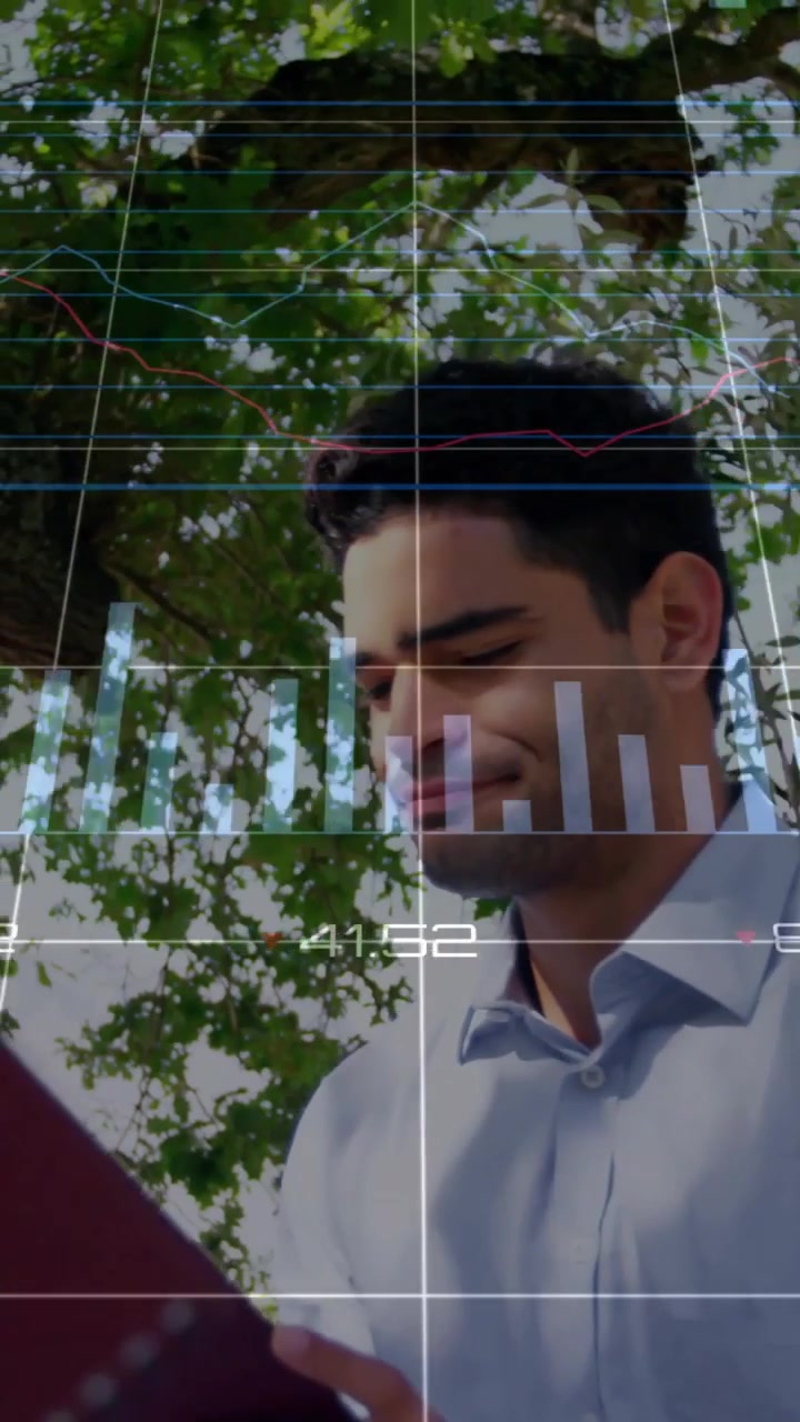 Vertical video: Camera closing, man paging red folder and leading biz brief while charts overlaying