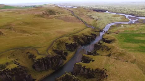 drone shot through canyon in iceland